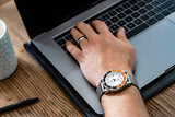 Aquacy Seiko Movement Watch Orange And Black On Wrist Computer