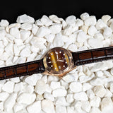 TIGERS EYE STONE Watch Laying on stones Picture