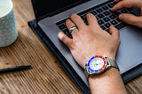 Aquacy Mesh Bracelet Watch Red Blue And Silver On Wrist Computer